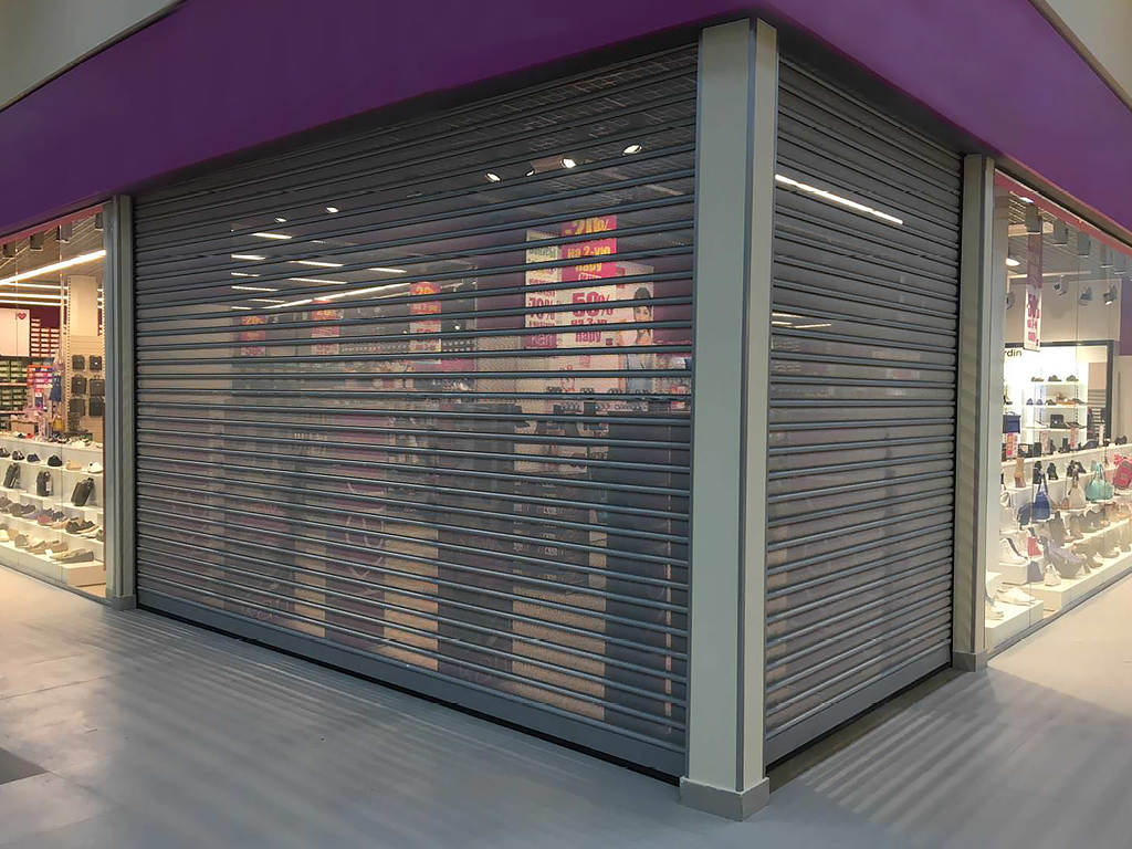 Рулонные ворота из стальных профилей (взломоустойчивые) RHS117, RHS117P с вальным электроприводом